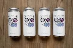 Happy Hour 28 Huckleberry Haze IPA 4 Pack featuring four cans of juicy, fruit-forward IPA with notes of huckleberry, tropical fruit, citrus, and hints of strawberry