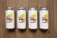 Happy Hour 31 Whoa Nellie Mexican-Style Lager 4 Pack including four cans of smooth Mexican-style lager brewed with flaked corn, light and crisp flavor, and a bright yellow sun design.